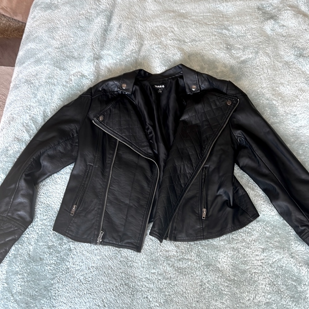 COPY - Black leather jacket, metal detailing, shorter in the back